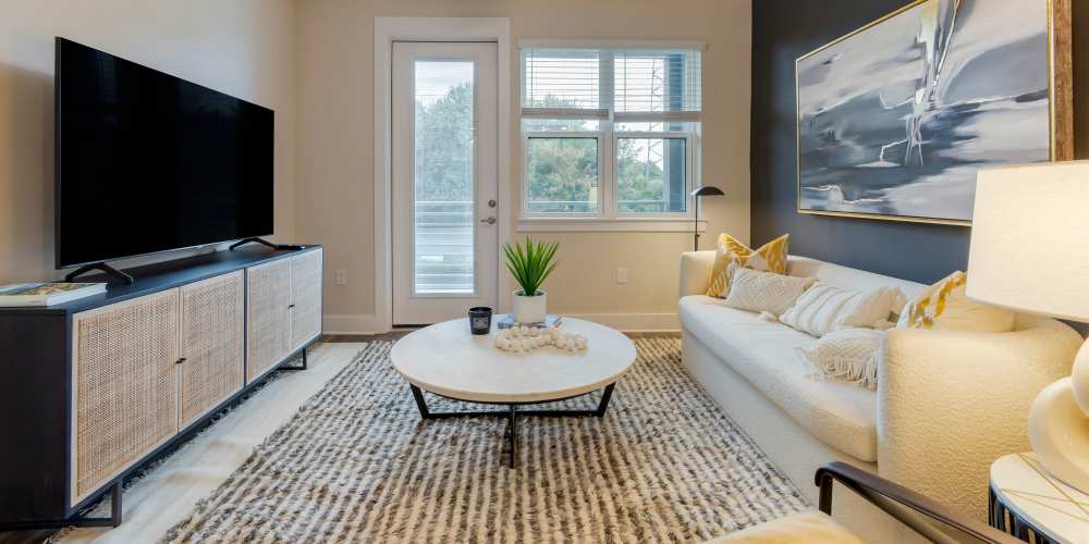 Modern furnishing's in a model home's living area at The Calvert in Charlotte, North Carolina