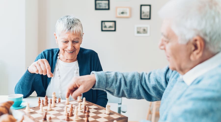 Residents playing chess at Mill Hill Residence in West Yarmouth, Massachusetts
