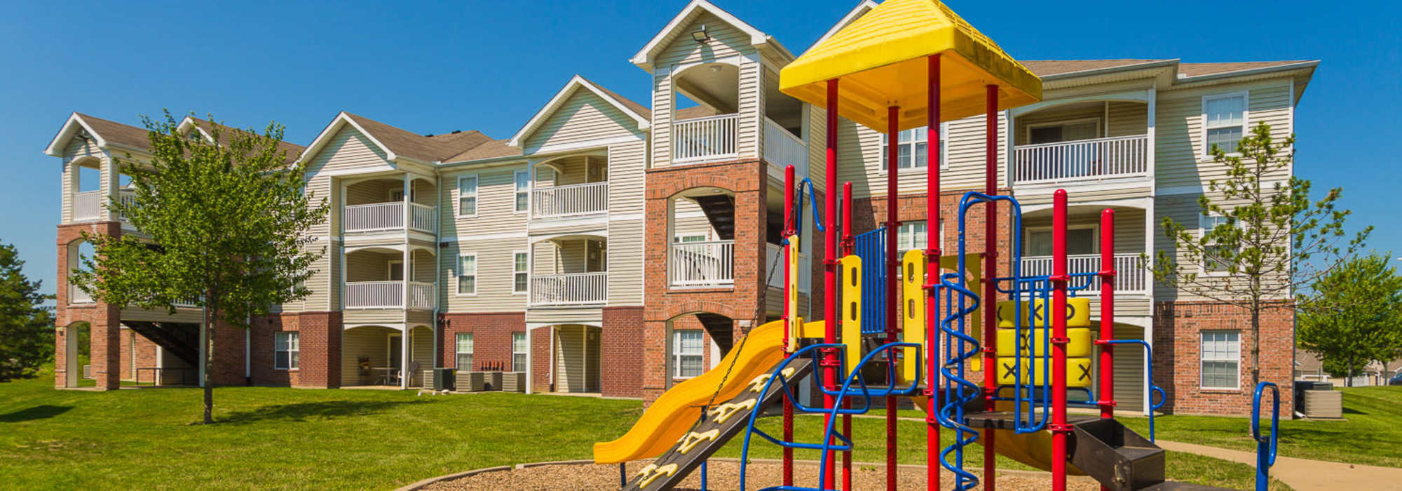 Kids outdoor play area at North Oak Crossing in Kansas City, Missouri