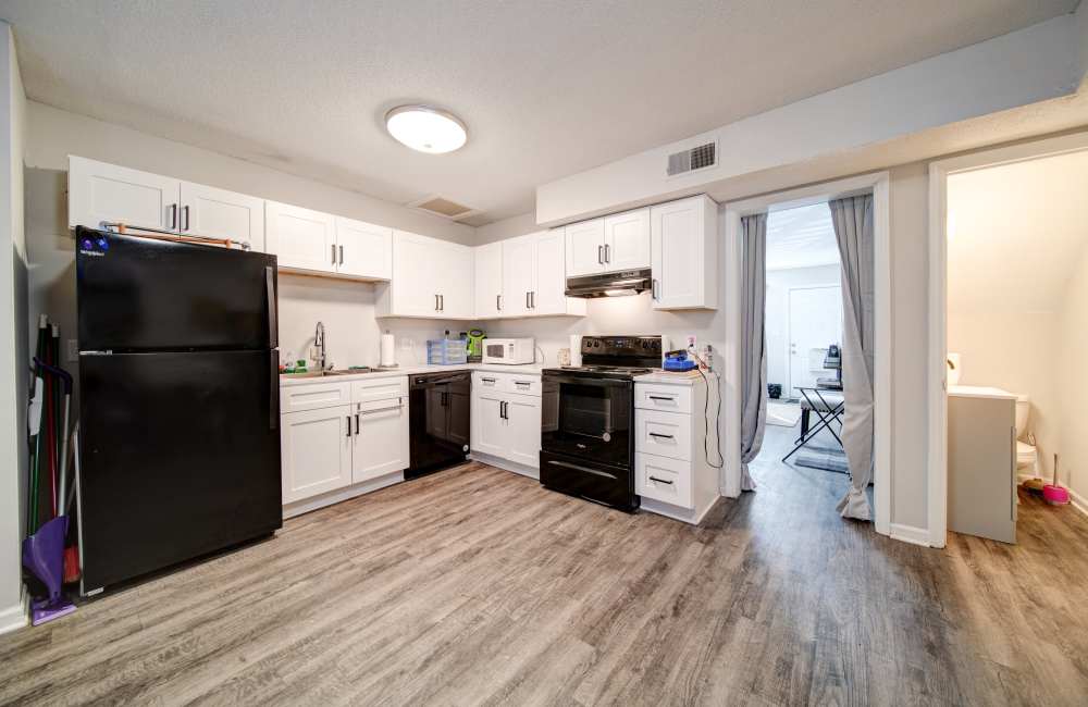 Fully equipped kitchen at Arlington Village Townhomes in Greenville, North Carolina