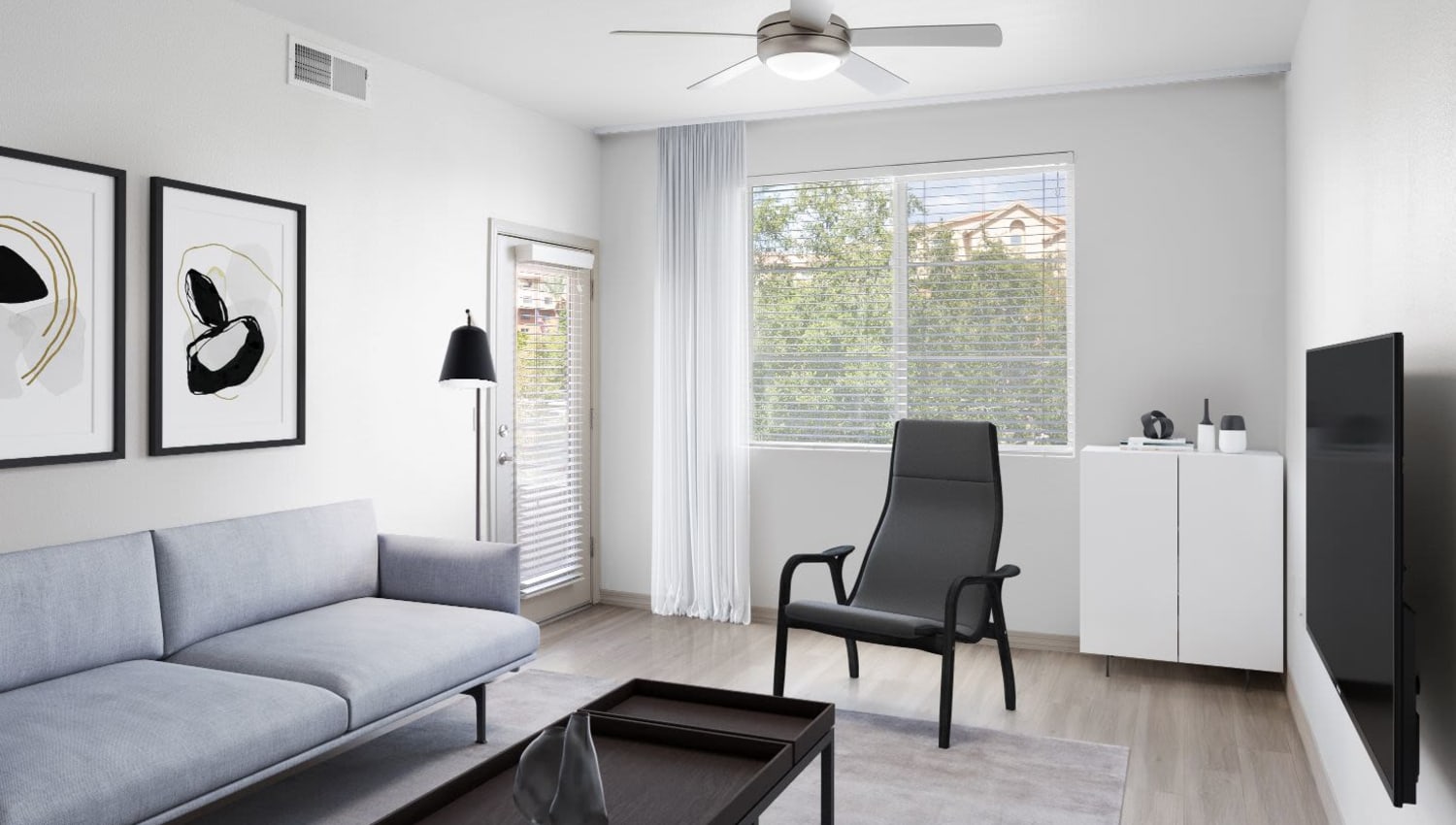 Living room at Ocio Plaza Del Rio in Peoria, Arizona