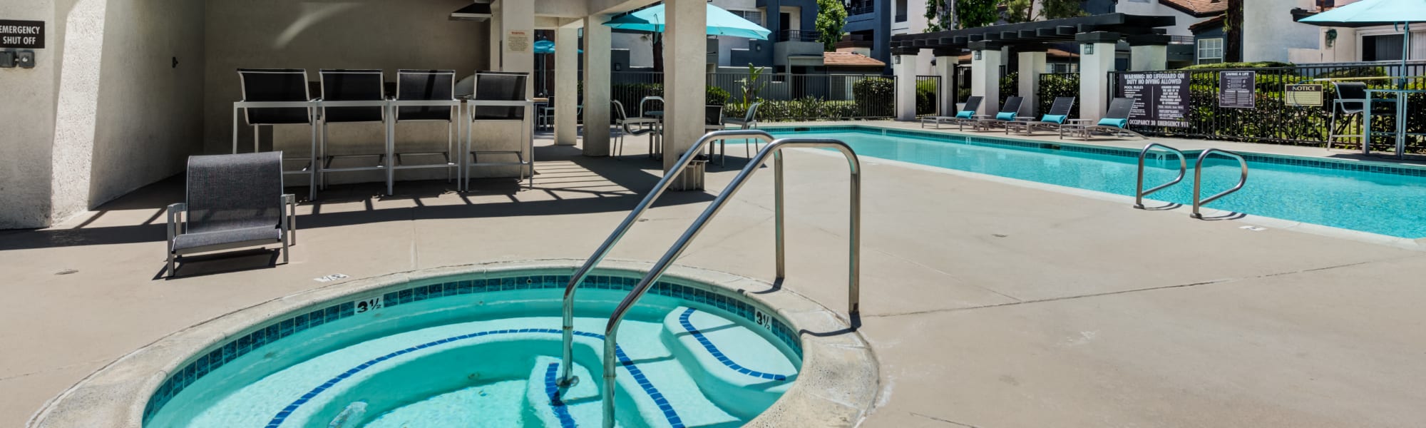 Hot tub sauna by community swimming pool at The Bluffs in Rancho Cucamonga, CA