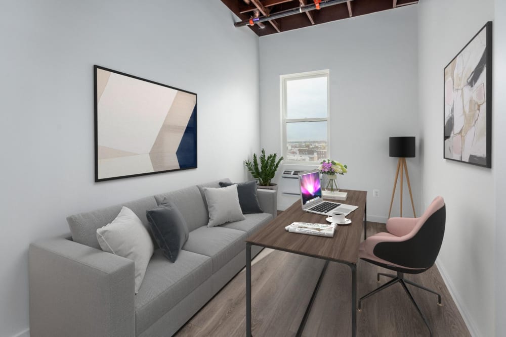 Office area with desk and couch at Brush Factory Lofts in Philadelphia, Pennsylvania