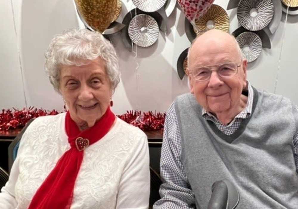 Resident couple smiling for the camera at Turners Rock in Springfield, Missouri