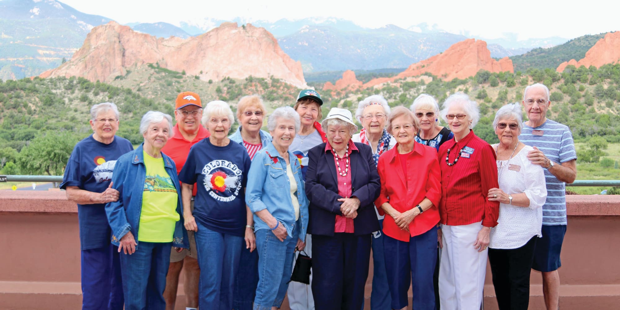 Residents from Summit Glen in Colorado Springs, Colorado in front of a beautiful landscape