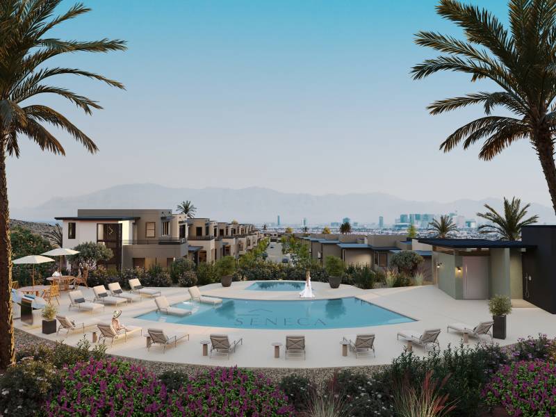 Resident relaxing at the pool at Seneca at Southern Highlands in Las Vegas, Nevada