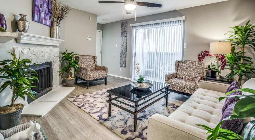 Cozy living room with stylish seating at Sagamore Apartments in Benbrook, Texas 