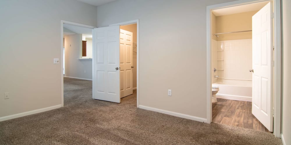 A plush carpeting in an apartment bedroom at Houston Lake Apartments in Kathleen, Georgia