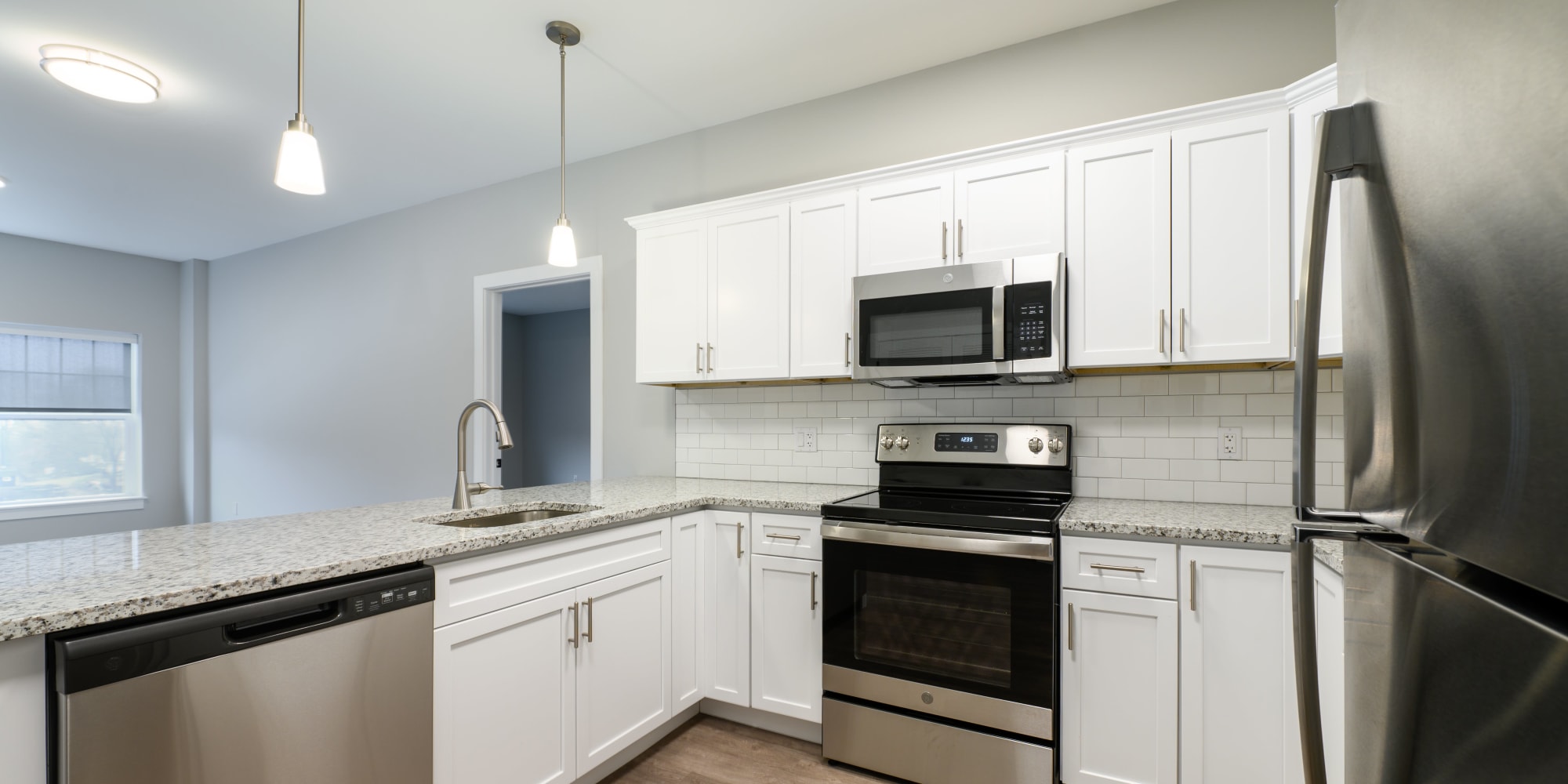 Our Modern Apartments in Cheshire, Connecticut showcase a Kitchen