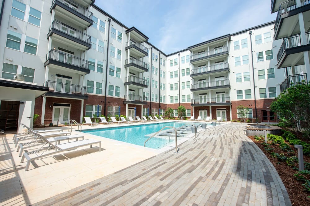 Pool with chairs on a sunny day