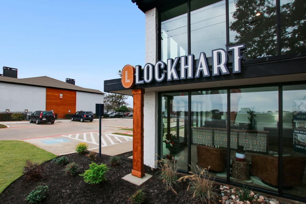 Apartment signage and leasing office at Lockhart Apartment Homes in Mesquite, Texas