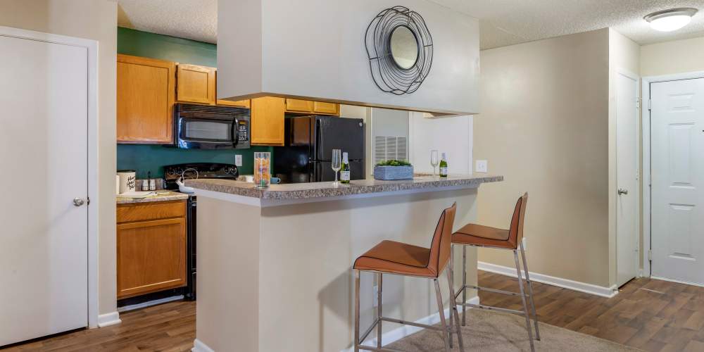 Kitchen with chairs at Avenue at Harbison in Columbia, South Carolina