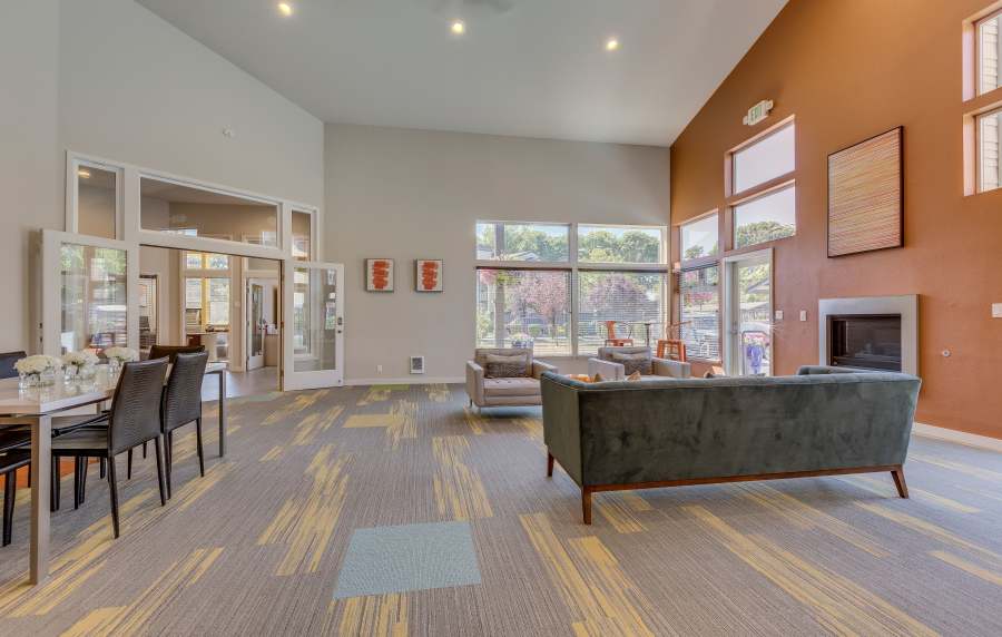 Indoor lounge with couch at Foundry on Fifth in Renton, Washington