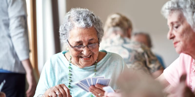 Residents playing cards at The Blake at Biloxi in Biloxi, Mississippi