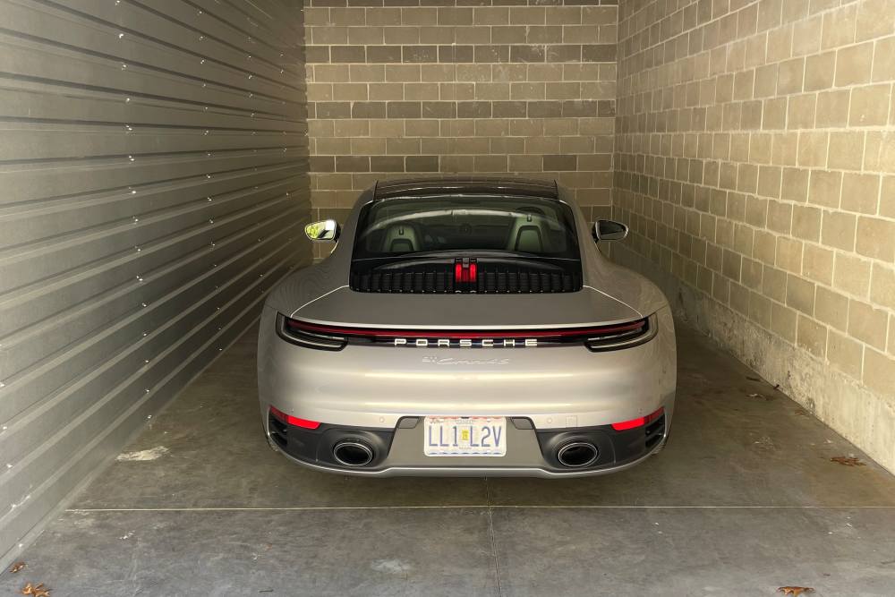 Outside Storage Units with a car inside at A-1 Locker Rental - Fenton in Fenton, Missouri
