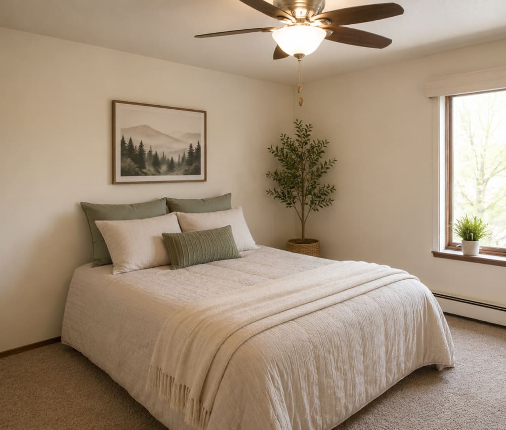 Bedroom with vinyl flooring at Gateway Hills in Ames, Iowa