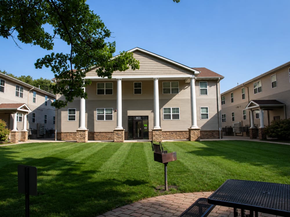 Apartment building with lawn at South Meadow in Ames, Iowa