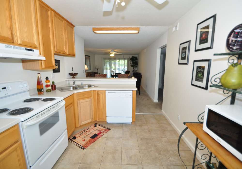 Kitchen with appliances at The Hills in San Diego, California