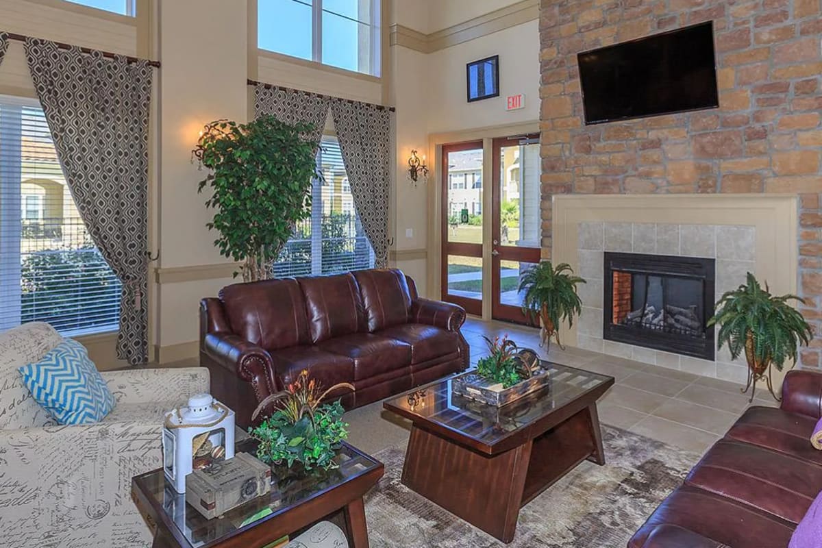 Cozy Garden Style living room with fireplace at Villas On Independence in Port Lavaca, Texas