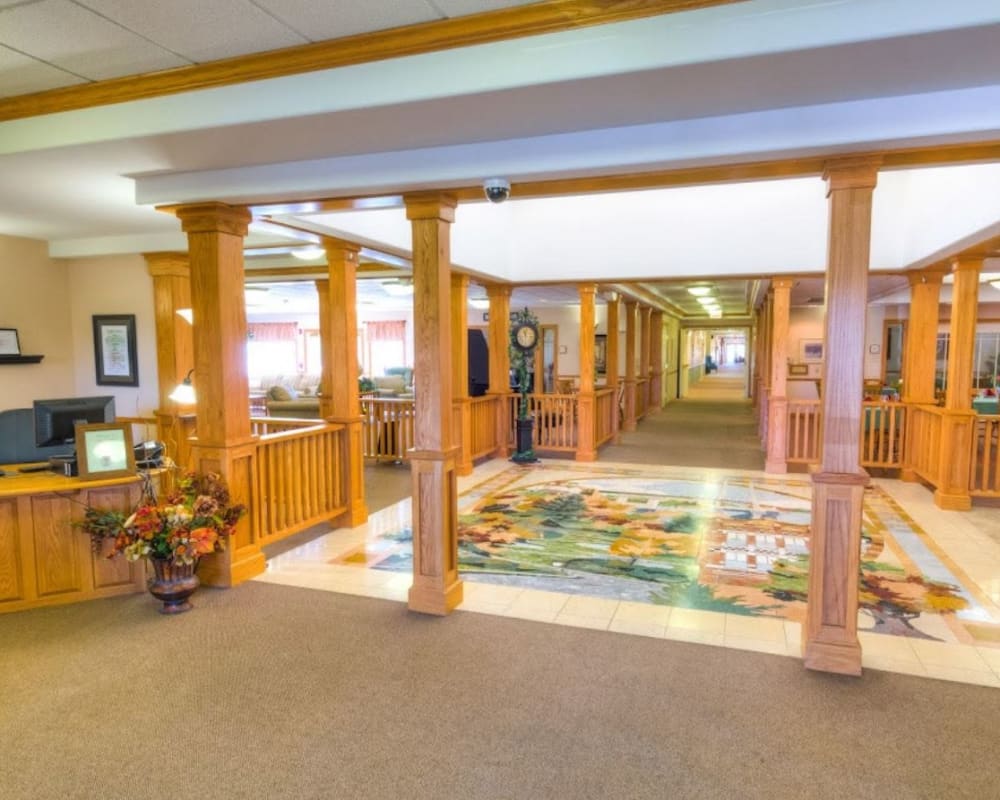 Main lobby with tile mosaic at Addington Place of Burlington in Burlington, Iowa.