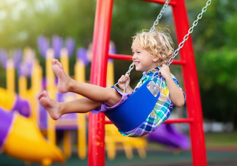 Resident kid playing in the park near Pacific Landing in Murrieta, California