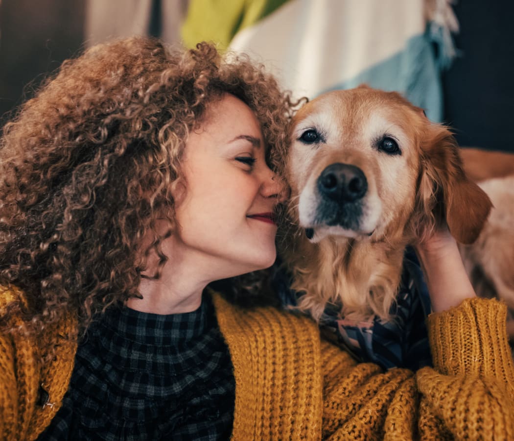 Resident and her dog at Cimarron Pointe Apartments in Oklahoma City, Oklahoma
