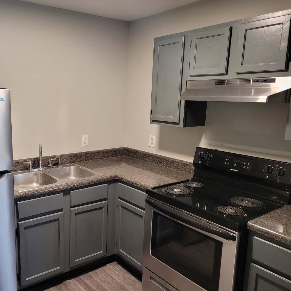 A kitchen with premium interior features at Maple Manor Apartments in Lebanon, Tennessee