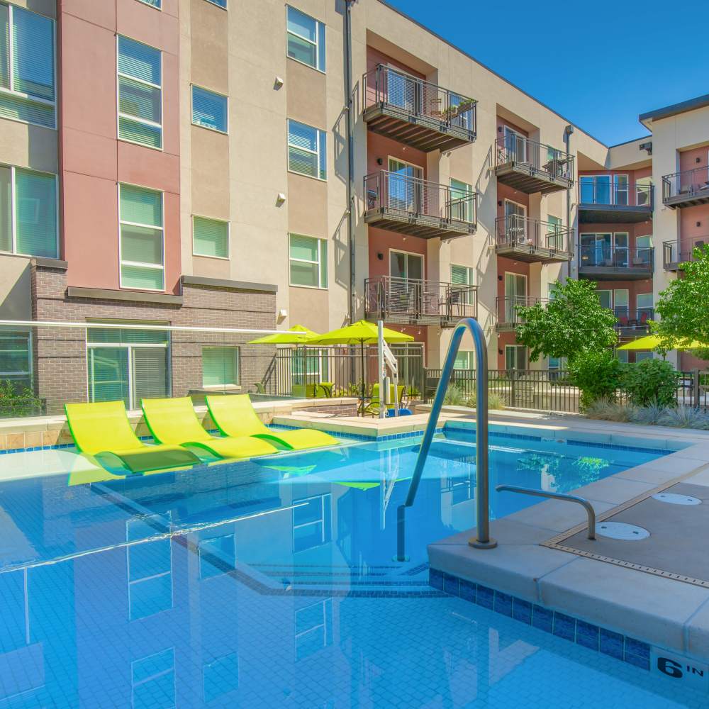 Resort-style swimming pool at Park Place Olde Town Apartments in Arvada, Colorado