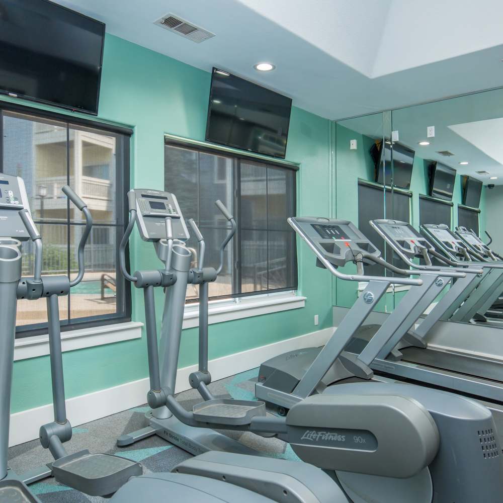 Fitness center with treadmills at One Belmar Place in Lakewood, Colorado