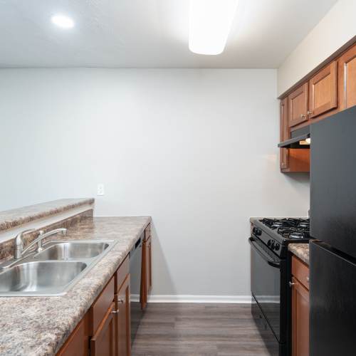Kitchen with modern appliances at Twyckenham Apartments in Lafayette, Indiana