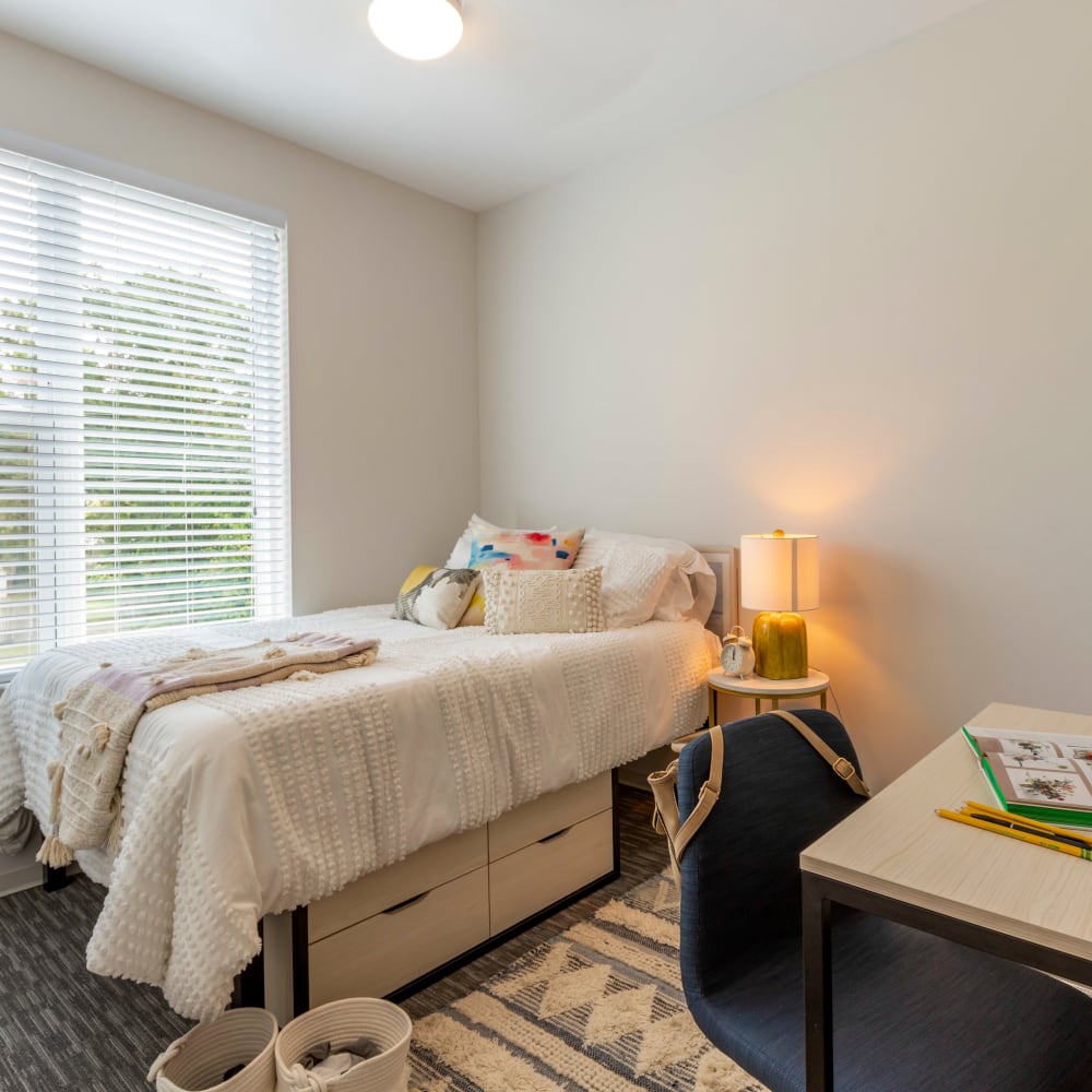 Cozy bedroom at UNCOMMON Wilmington in Wilmington, North Carolina
