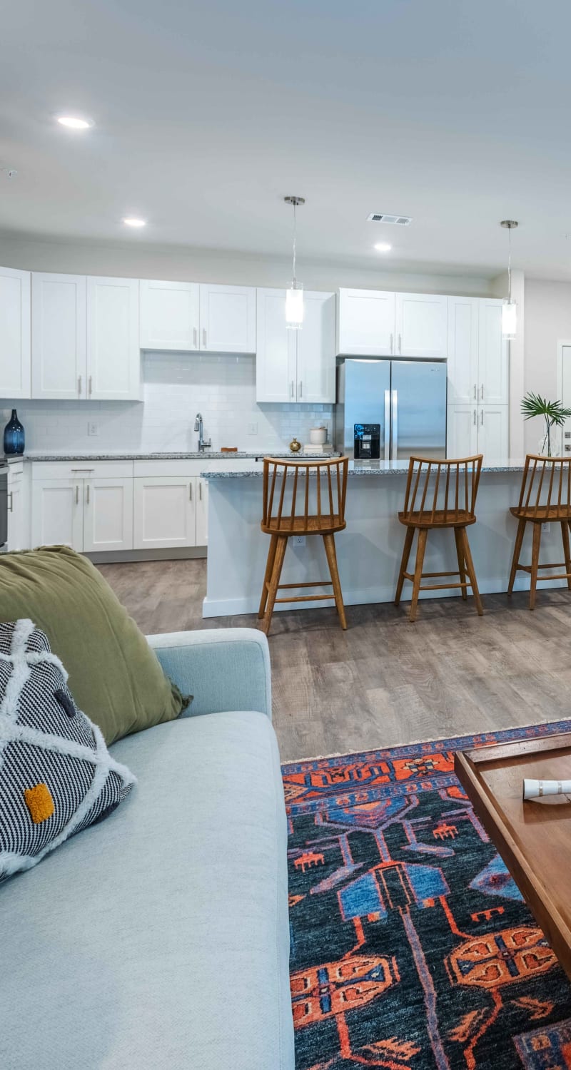 Living space leading into kitchen at Artisan Carolina Forest in Myrtle Beach, South Carolina