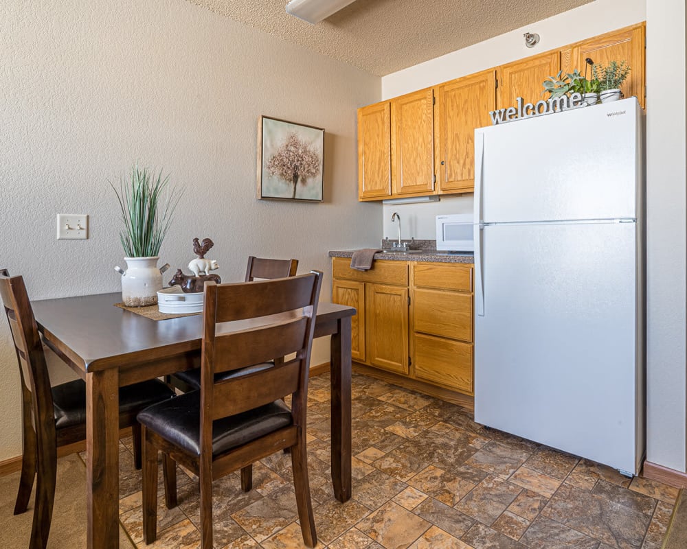 Resident apartment with a kitchenette at Traditions of Owatonna in Owatonna, Minnesota.