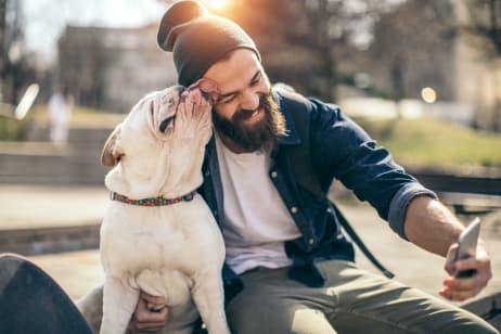 Man taking a selfie with his dog near Berkshire Laurel Creek, Fairfield, California