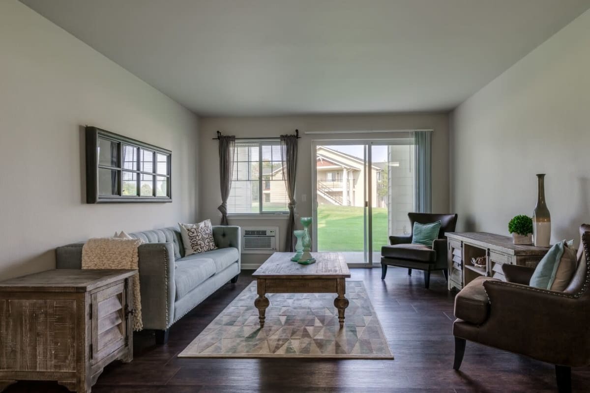 Wood-style flooring in an apartment living room at Rockwood Lodge in Coeur D Alene, Idaho