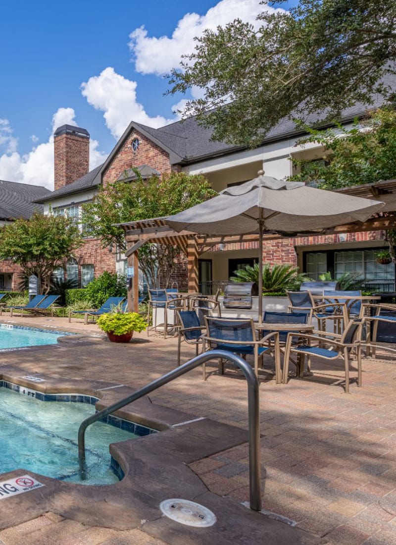 Pool and covered seating at Marquis on Memorial in Houston, Texas