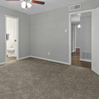 Unfurnished room with access to bathroom at Aria Residences in Mesquite, Texas