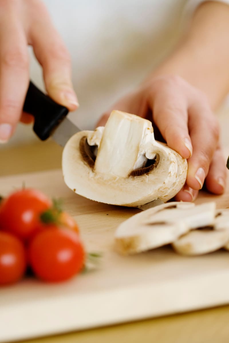 Cutting up fresh vegetables at Bell Tower Residence Assisted Living in Merrill, Wisconsin