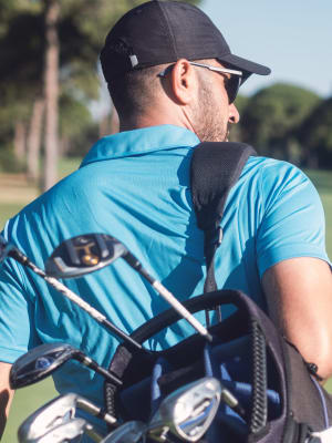 Resident golfing near Henley at The Rim in San Antonio, Texas