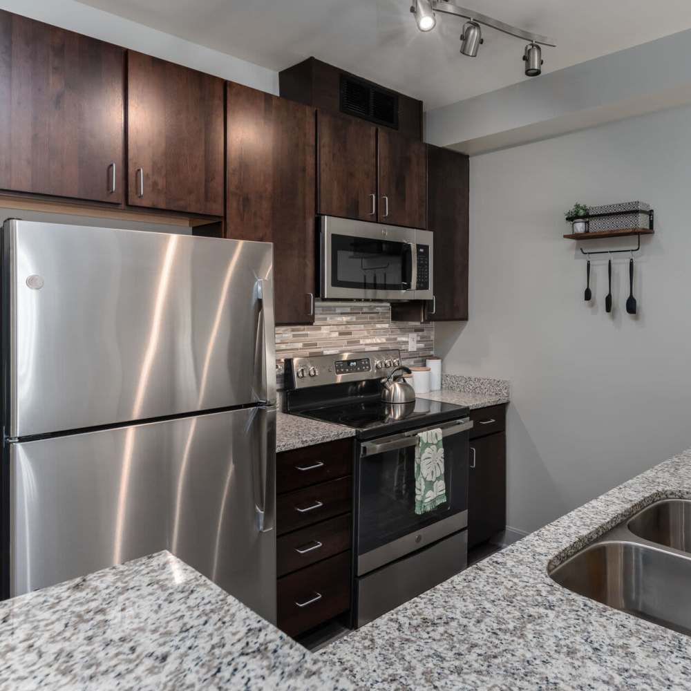 Kitchen with stainless-steel appliances at Current at The Banks in Cincinnati,Ohio