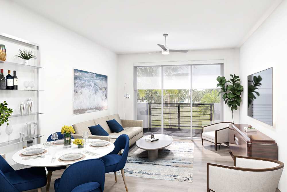 Living area with large patio doors at Bocora in Boca Raton, Florida