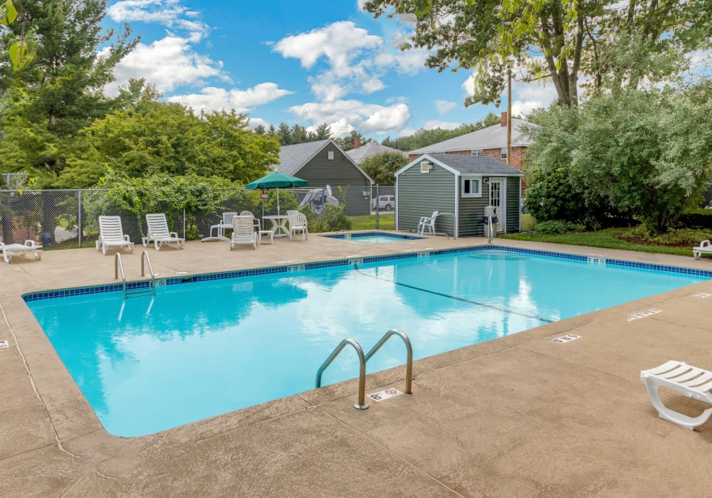 Crystal clear blue pool at Eagle Rock Apartments at Nashua in Nashua, New Hampshire