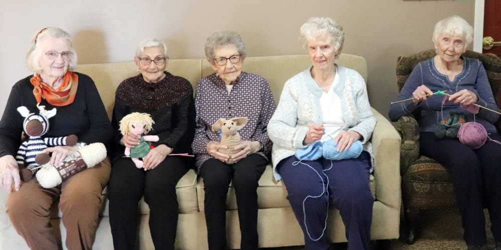 Residents socializing and knitting at The Springs at Whitefish in Whitefish, Montana