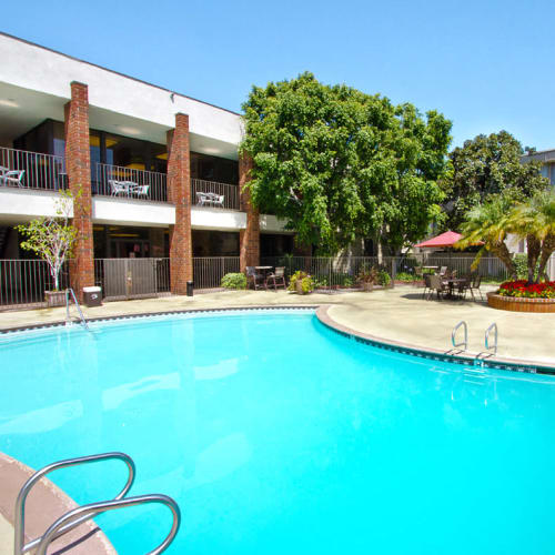 The sparkling swimming pool at Park Regency Club Apartments in Downey, California