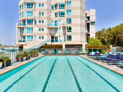 Resort-style swimming pool with underwater lap lanes at Esprit Marina del Rey in Marina del Rey, California