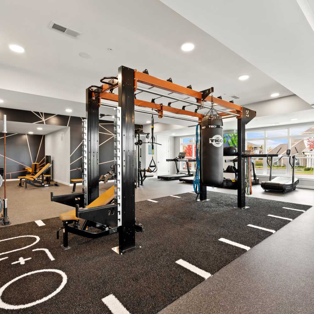 Fitness center with various equipment at Neo Vantage Point in Maryland Heights, Missouri