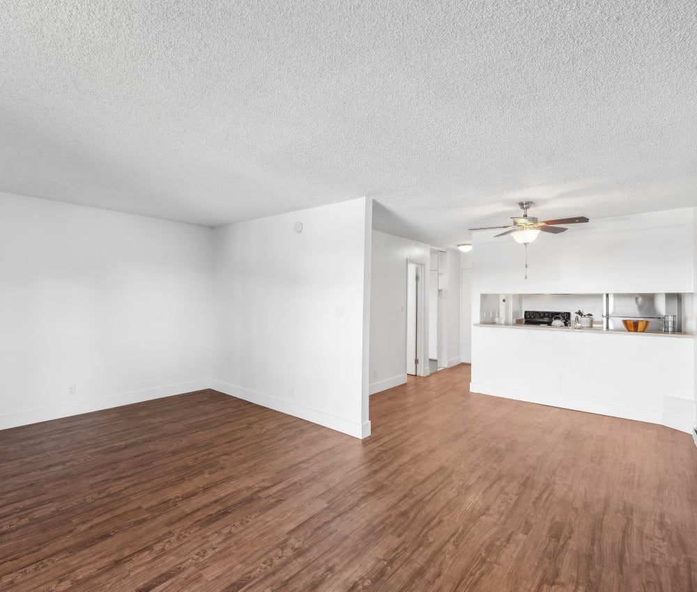 Spacious apartment with wood-style flooring at The Ralston at Belmont Hills in Belmont, California