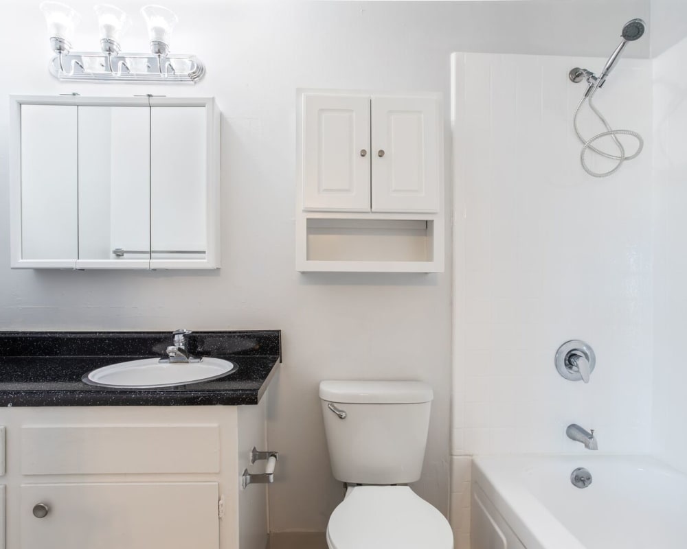 Bathroom with shower and updated counters at Courtyard in Hayward, California