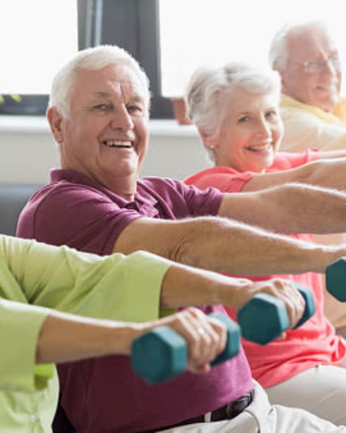 Residents participating in a fitness class at The Springs at Bozeman in Bozeman, Montana.