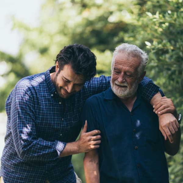 father and son walking at The Atrium at Carmichael in Carmichael, California.